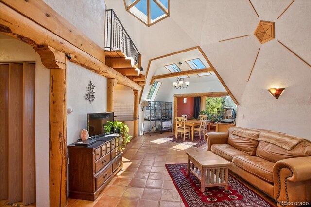 living room featuring a notable chandelier, tile flooring, and a towering ceiling