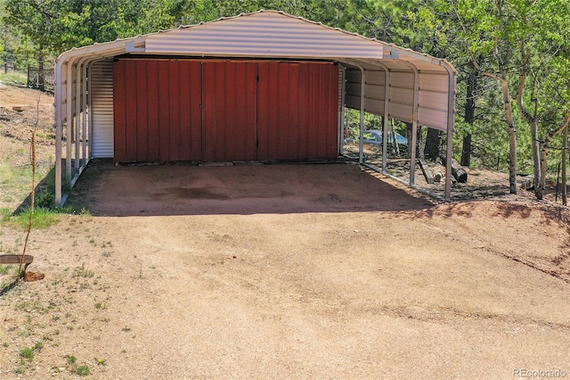 garage with a carport