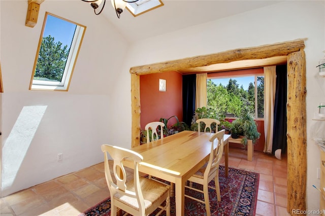 47 Aspen Rd, Woodland Park, CO 80863 - dining area featuring lofted ceiling and a chandelier