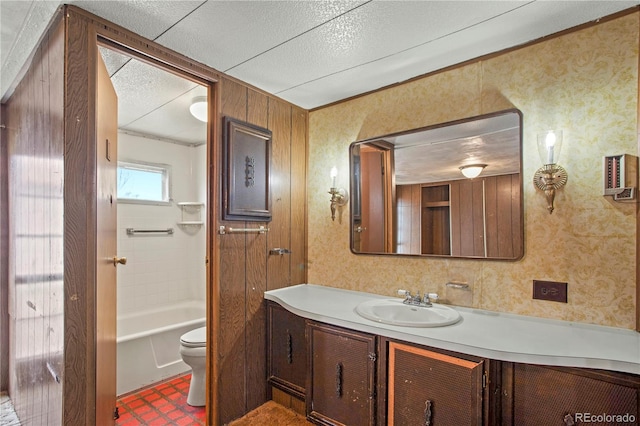 full bathroom with vanity, toilet, and tiled shower / bath