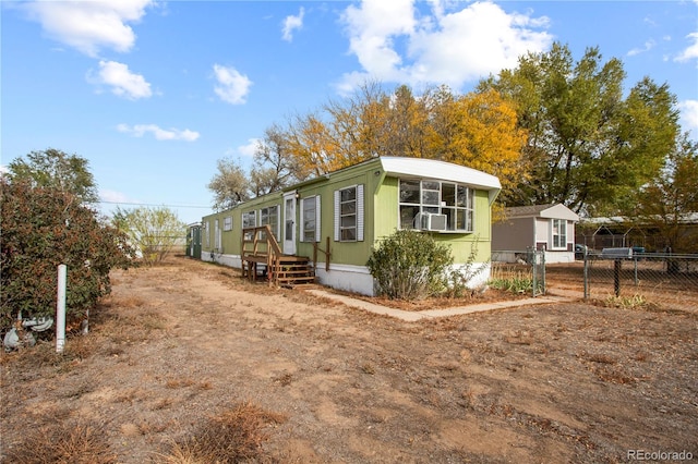 view of side of home with cooling unit