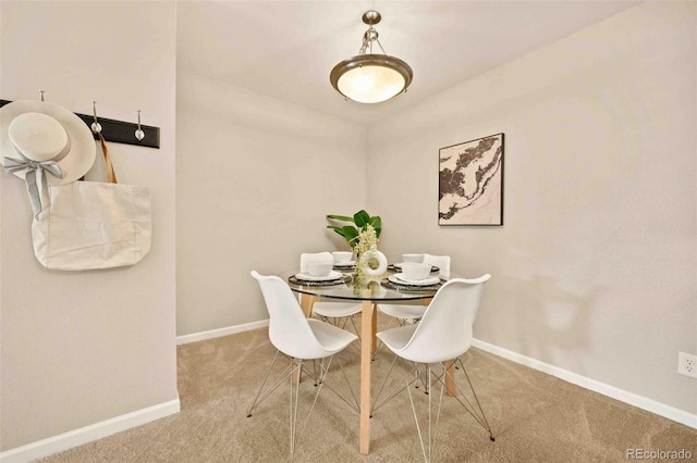 13085 W Cedar Dr Unit 114, Lakewood, CO 80228 - dining space featuring baseboards and carpet floors