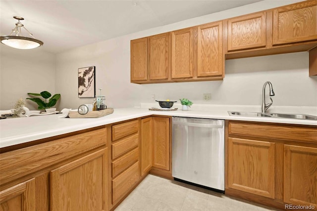 13085 W Cedar Dr Unit 114, Lakewood, CO 80228 - kitchen featuring light countertops, a sink, decorative light fixtures, and dishwasher