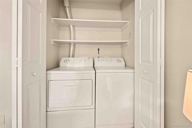 13085 W Cedar Dr Unit 114, Lakewood, CO 80228 - washroom featuring washing machine and clothes dryer and laundry area