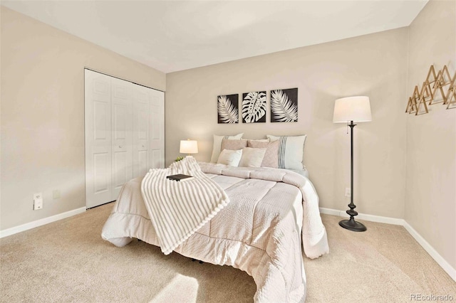 13085 W Cedar Dr Unit 114, Lakewood, CO 80228 - carpeted bedroom with baseboards and a closet