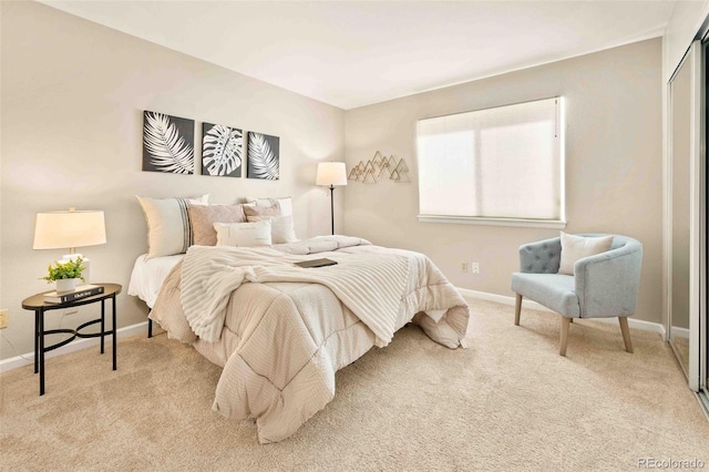 13085 W Cedar Dr Unit 114, Lakewood, CO 80228 - bedroom with carpet flooring and baseboards