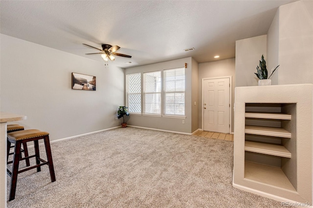 6745 S Winnipeg Cir Unit 103, Aurora, CO 80016 - unfurnished room featuring carpet flooring, a ceiling fan, baseboards, and recessed lighting
