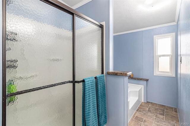 full bath with a garden tub, crown molding, stone finish flooring, a shower stall, and a textured ceiling