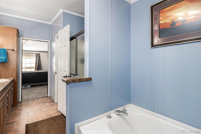 bathroom with ensuite bath, stone finish floor, ornamental molding, vanity, and a shower stall