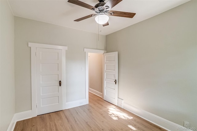 575 N Marion St, Denver, CO 80218 - unfurnished bedroom with light wood-type flooring and ceiling fan