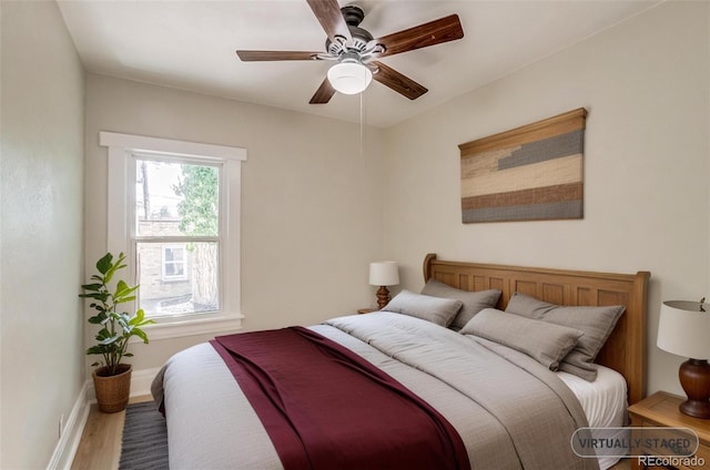 575 N Marion St, Denver, CO 80218 - bedroom featuring wood finished floors and a ceiling fan