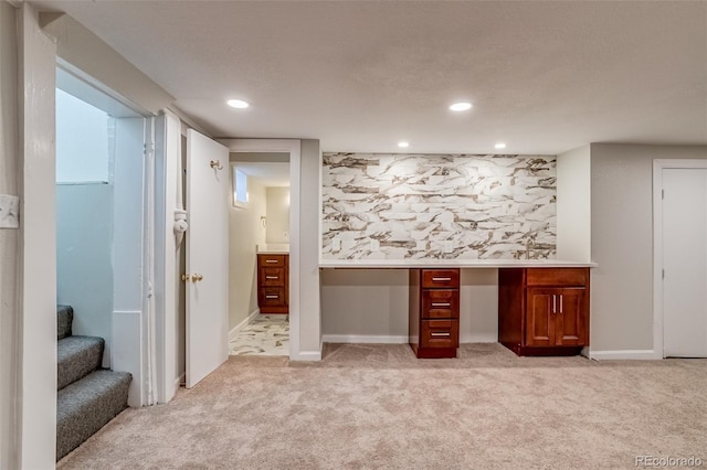 575 N Marion St, Denver, CO 80218 - basement featuring light colored carpet, a desk, and recessed lighting