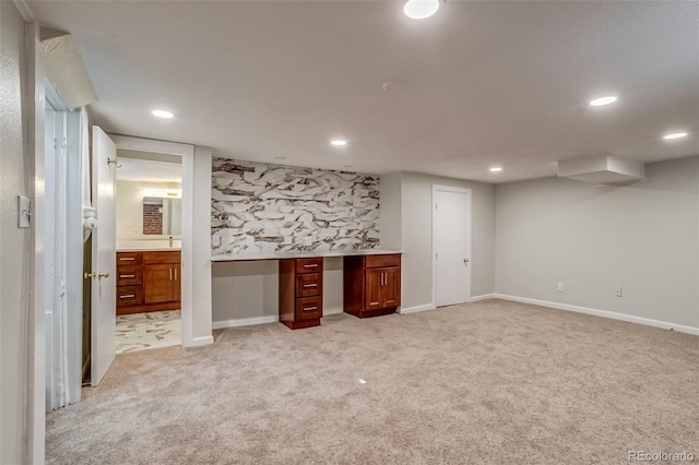 575 N Marion St, Denver, CO 80218 - finished below grade area with light colored carpet, recessed lighting, and an office area