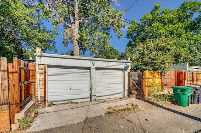 575 N Marion St, Denver, CO 80218 - detached garage featuring a gate