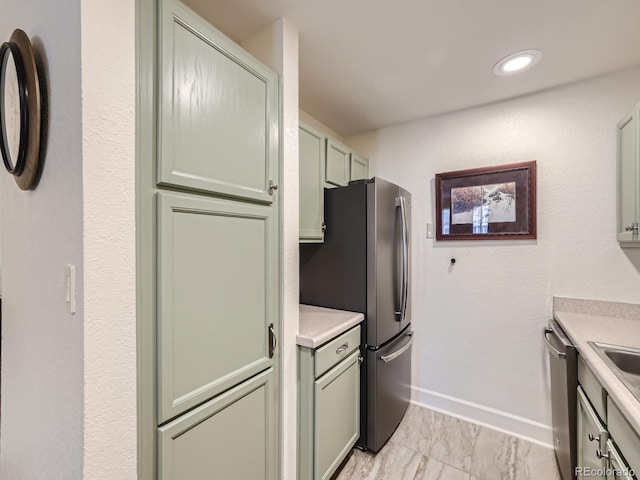 kitchen with stainless steel appliances and light tile patterned floors