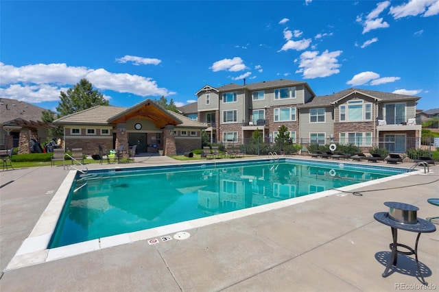 view of pool featuring a patio