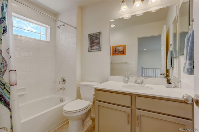 full bathroom with shower / tub combo with curtain, vanity, and toilet