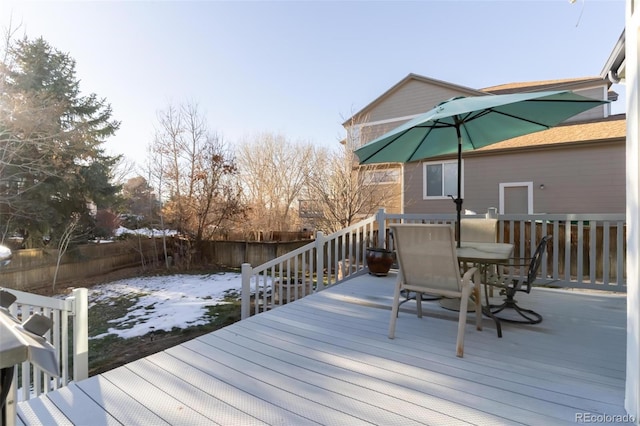 view of snow covered deck