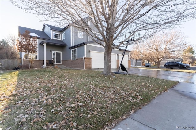 view of side of home with a lawn and a garage