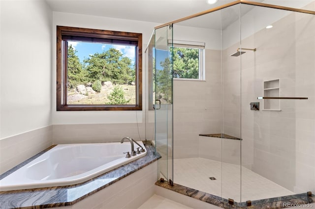 bathroom with independent shower and bath