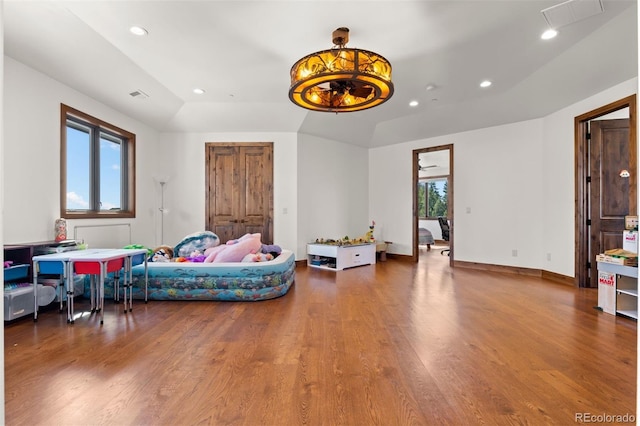 interior space featuring a healthy amount of sunlight and hardwood / wood-style floors