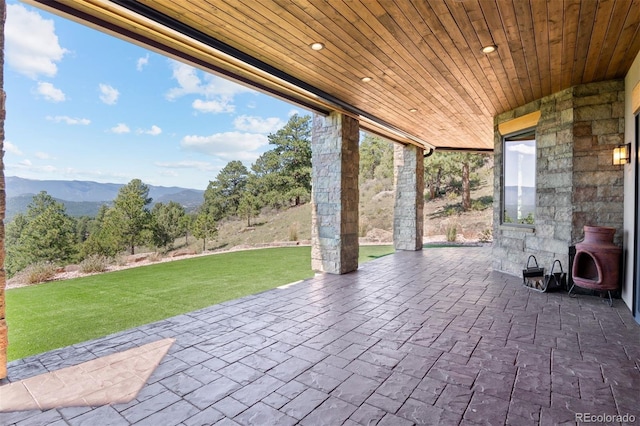 view of patio / terrace with a mountain view