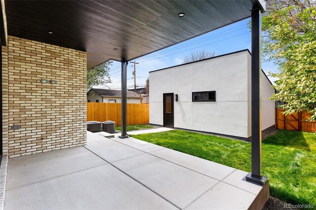 357 S Franklin St, Denver, CO 80209 - view of patio featuring an outbuilding