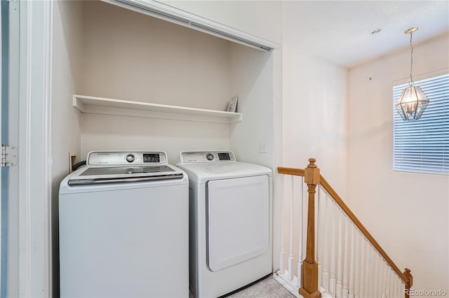 laundry area with separate washer and dryer