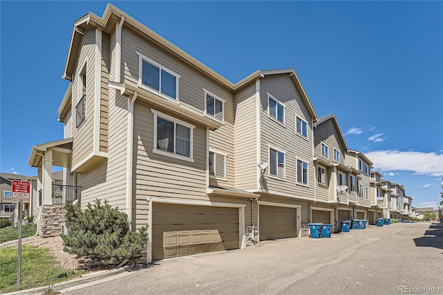 view of building exterior featuring a garage