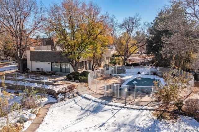 view of snow covered pool