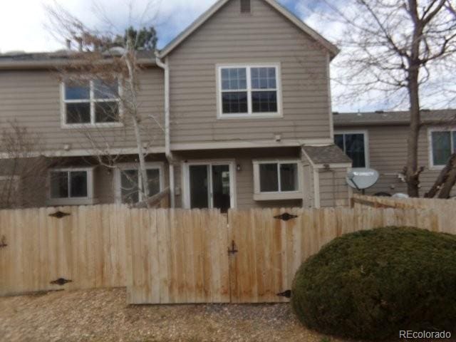 view of front of property with fence