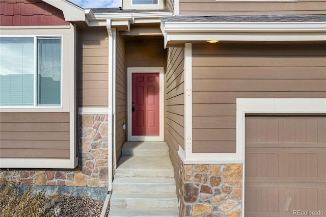 entrance to property with a garage