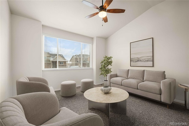 living room featuring ceiling fan, lofted ceiling, and carpet flooring