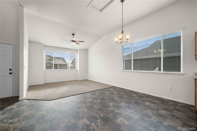 interior space with ceiling fan with notable chandelier and vaulted ceiling