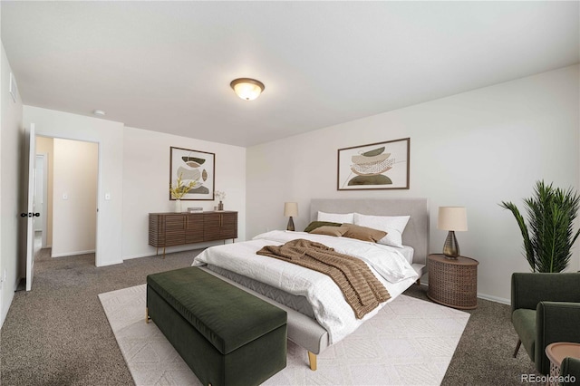 bedroom with light colored carpet