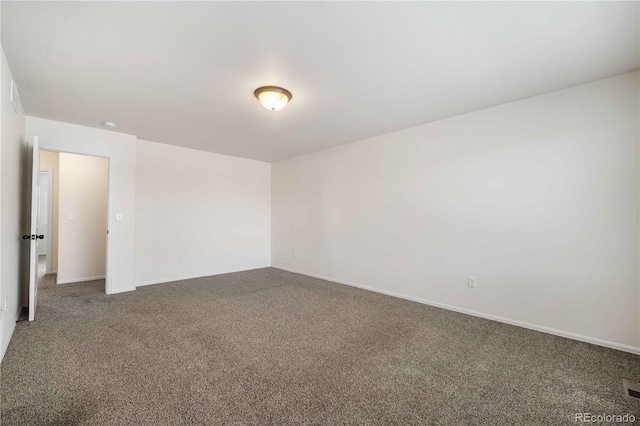 spare room with carpet floors