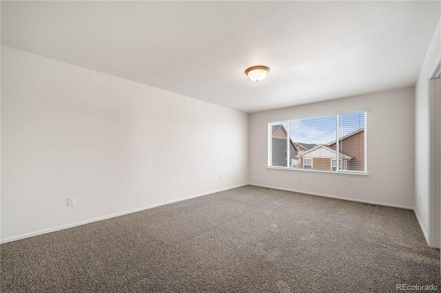 empty room featuring carpet