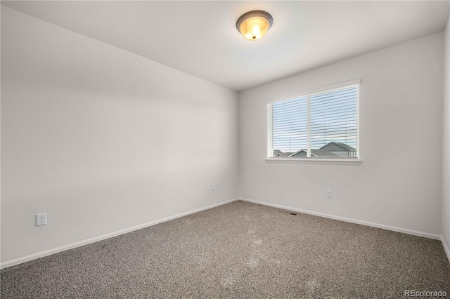 view of carpeted spare room