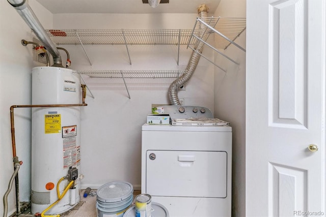 washroom featuring washer / clothes dryer and water heater