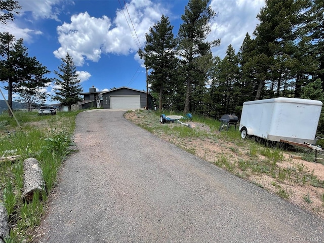 29657 Loomis Way, Golden, CO 80403 - view of front facade featuring a garage