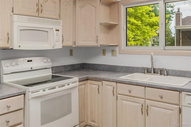 12319 W Burgundy Ave, Littleton, CO 80127 - kitchen with white appliances, light brown cabinets, and open shelves