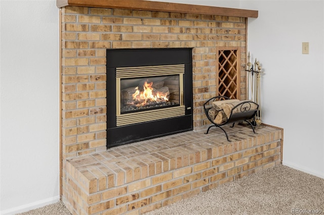 12319 W Burgundy Ave, Littleton, CO 80127 - detailed view of carpet floors and a brick fireplace