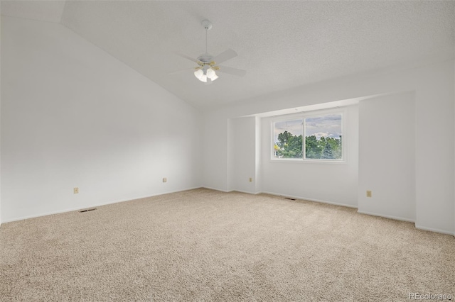 12319 W Burgundy Ave, Littleton, CO 80127 - spare room featuring lofted ceiling, a ceiling fan, and light carpet