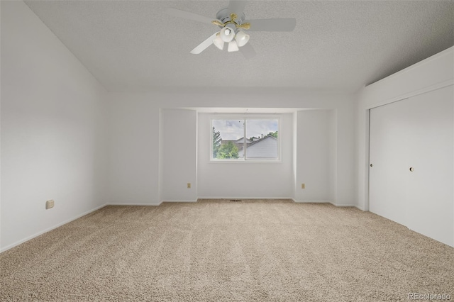 12319 W Burgundy Ave, Littleton, CO 80127 - unfurnished bedroom with light carpet, a textured ceiling, and ceiling fan
