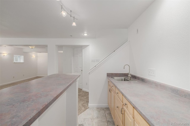 12319 W Burgundy Ave, Littleton, CO 80127 - kitchen featuring light brown cabinetry and light tile patterned floors
