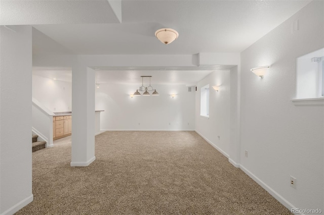 12319 W Burgundy Ave, Littleton, CO 80127 - below grade area with light carpet and stairway