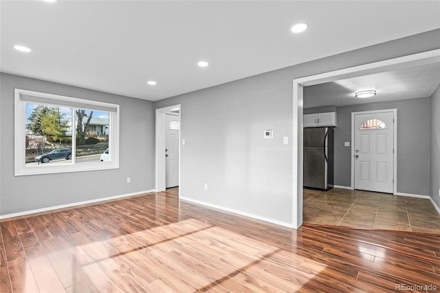 empty room featuring hardwood / wood-style floors