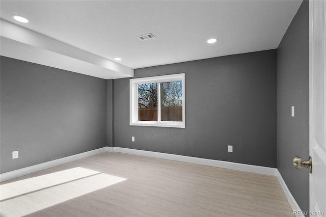 empty room with wood-type flooring