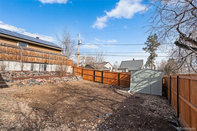 view of yard with a storage unit