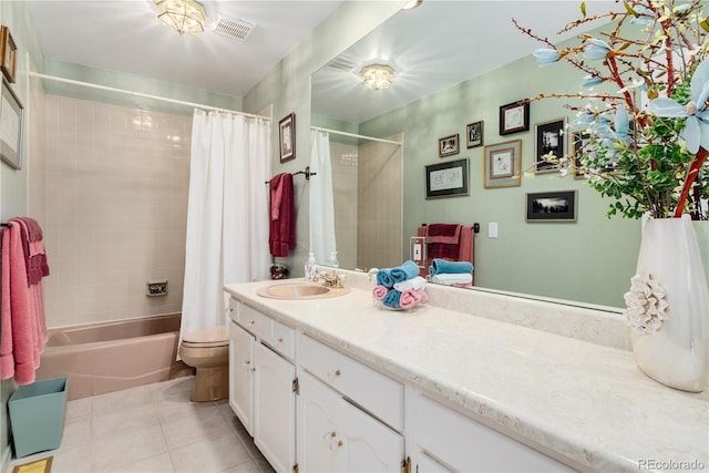 full bathroom with vanity, tile patterned flooring, toilet, and shower / bath combo